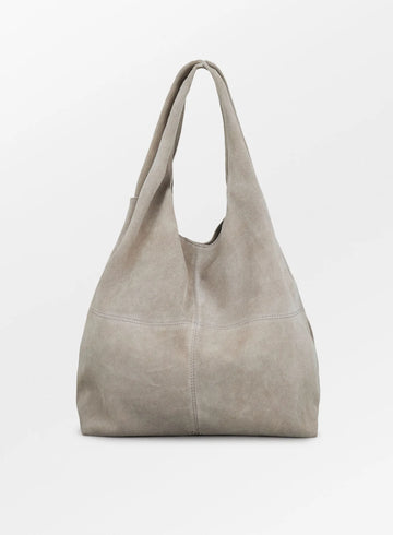 This beautiful Dalliea Bag from Becksondergaard in Porpoise Grey is the perfect bag for autumn/winter. It is crafted from a beautiful soft suede and features a large spacious compartment and a smaller zip-up pocket.  Also available in Hot Fudge Brown.