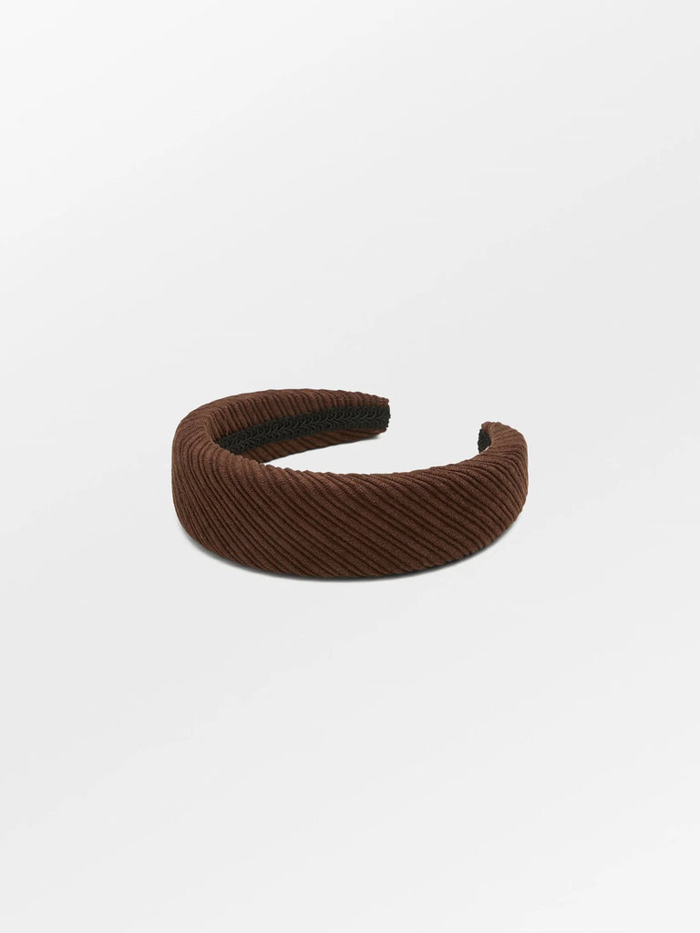 Adding a touch of elegance to any wardrobe the hot fudge brown cord hairbrace will complete your everyday and festive occasion outfits. Width is 4 cm.