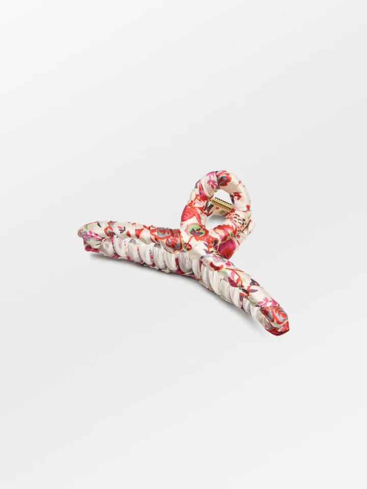 Our favourite hair claw is back this season in a fresh pretty floral pattern, keeping your tresses at bay