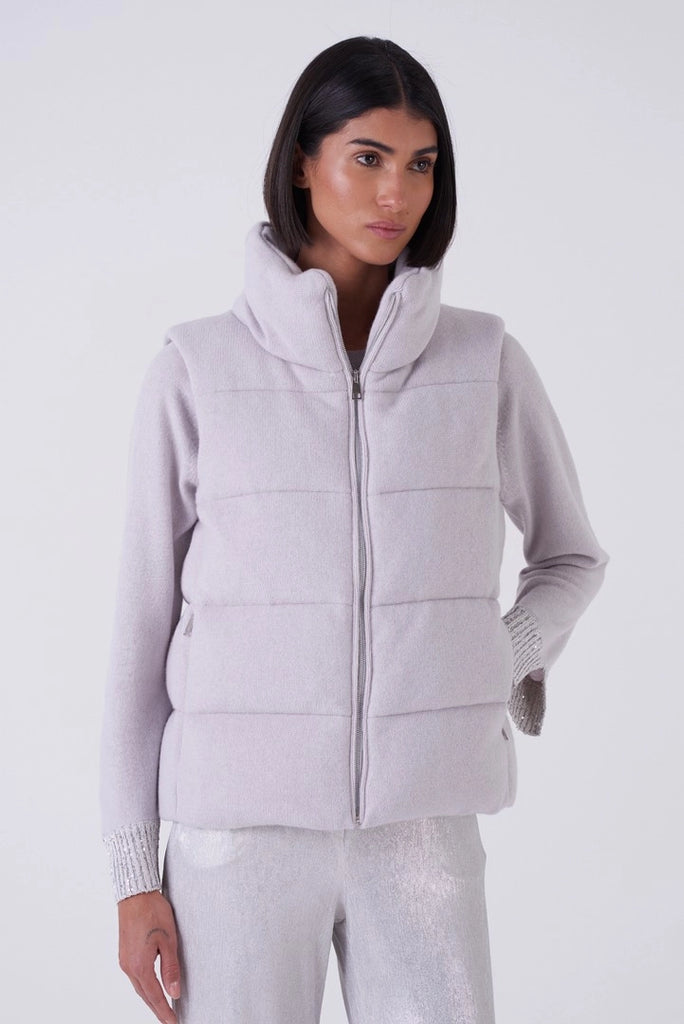 This is not your average gilet!&nbsp; From super luxe Italian brand Amina Rubinacci and crafted from a soft cashmere and wool blend and stuffed with down this will immediately elevate any outfit you put it over.&nbsp; Light as air but adding lots of warmth this is the perfect layering piece for over our work out kit as the temperatures drop!