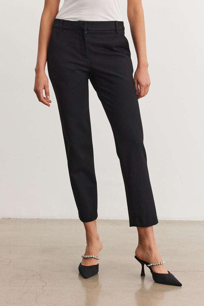 We love a classic black trousers and Jay from Velvet by Graham &amp; Spencer does not disappoint!&nbsp; In a super stretchy material and featuring a flat front, ankle length and straight shape these are great for dressing up or down.&nbsp; Gorgeous with a heel and a silk black but equally fab with a hoody and trainers!&nbsp; A definite wardrobe staple!