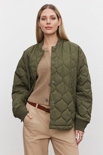 Say hello to Carrie!&nbsp; The perfect Fall jacket.&nbsp; In a great army green this quilted jacket is just the thing for when it get's a bit colder but not too cold!&nbsp; With a relaxed shape this is great over a jumper and paired with a straight let.&nbsp; One you'll reach for again and again.