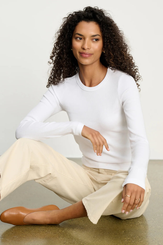 Sometimes nothing but a white tee will do.&nbsp; The long sleeved Lotta has just the right amount of stretch.&nbsp; Crafted from a ribbed cotton mix for a super comfortable close to the body feel (but not in any way clingy) and featuring a classic crew neckline and a slight crop this is a great layering piece but equally good on it's own.