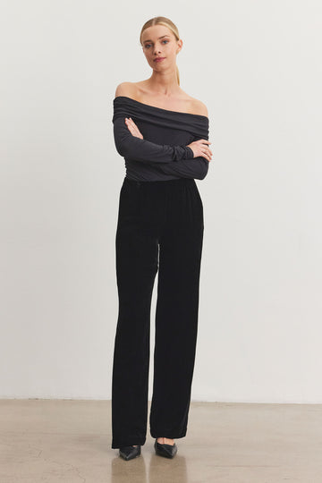 Every wardrobe needs a good quality pair of black velvet trousers and Sorine from Velvet by Graham &amp; Spencer does not disappoint!&nbsp; Featuring a wide leg and an elastic waistband these are super comfortable whilst being super stylish.&nbsp; Pair with a neat top or came these will serve you well!