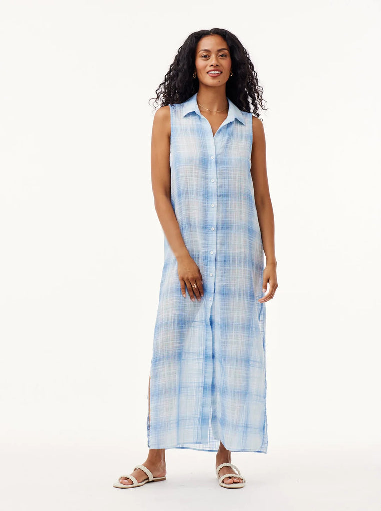 This Sleeveless Duster Dress from Bella Dahl is flowy and breathable, making it super easy to wear all summer long! In a subtle gingham, this dress features a button down front, side slits and a collar. Wear with white trainers whilst running errands or dress up for a garden party with sandals!