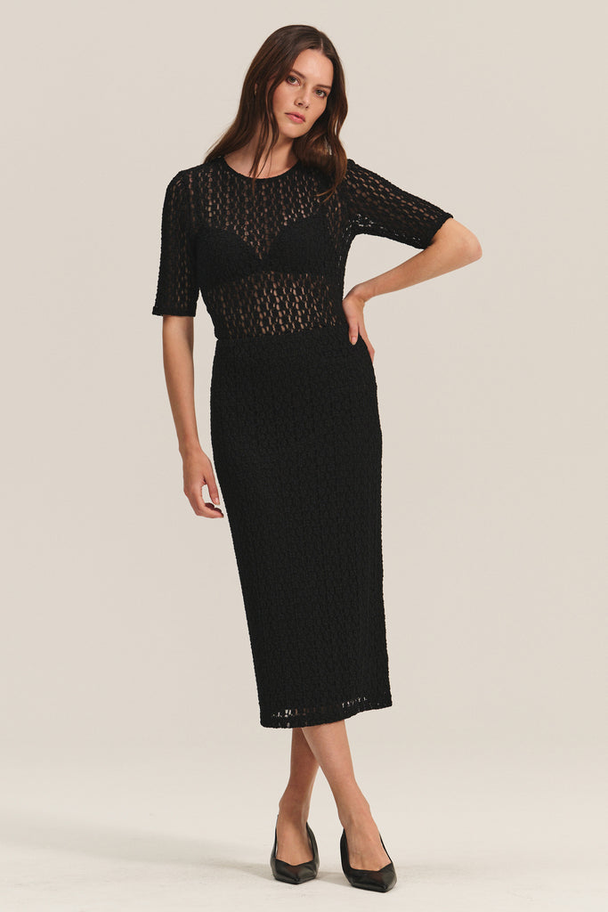 Oh we love a dress from Velvet by Graham &amp; Spencer and Tabitha is one of our favourites this year.&nbsp; Crafted from a super stretchy and forgiving stretch lace in always wearable black this is sexy in it's simplicity.&nbsp; Pair with a killer heel for a great night out!