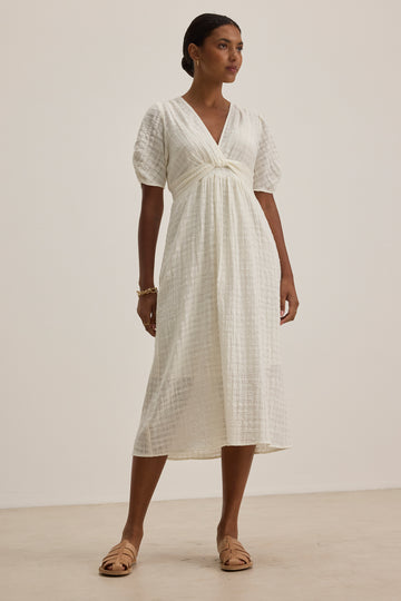 Oh we love a Summer dress from Velvet by Graham &amp; Spencer and Eloise is one of our favourites this year.&nbsp; In always wearable ivory and featuring a flattering v neck, slightly puffed sleeves, an empire waist shape and crafted from their super soft cotton gauze fabric this is the perfect simple Summer dress. Love it!