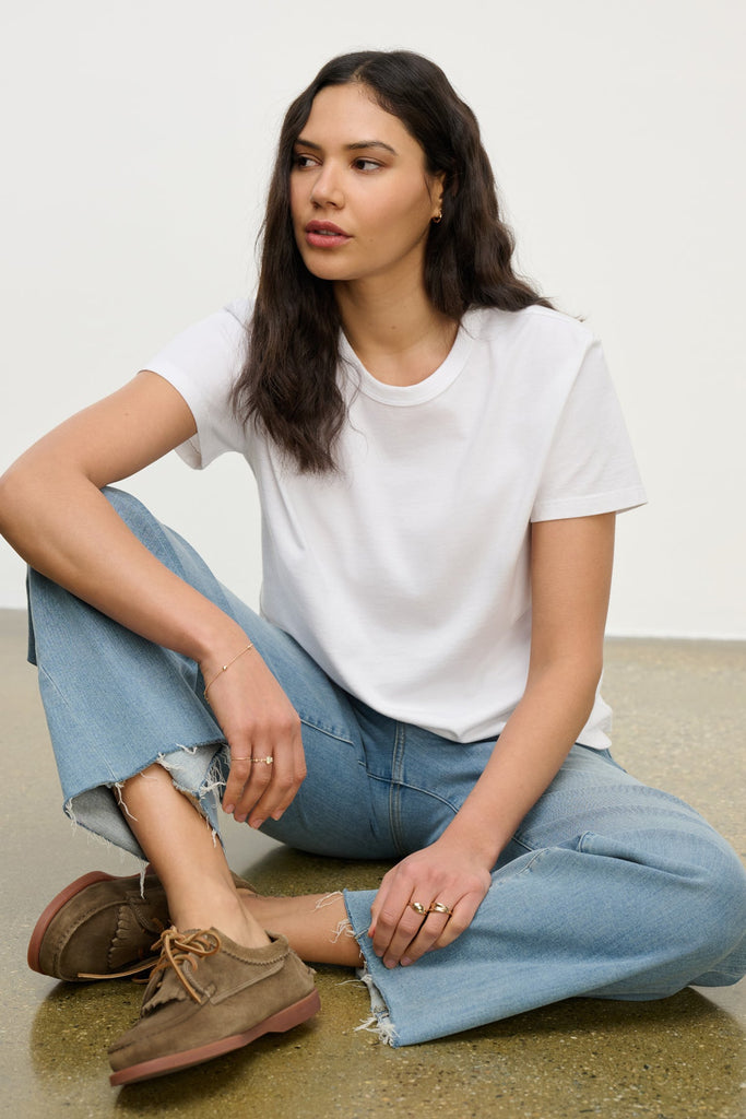 The Leigh Tee from Velvet by Graham &amp; Spencer is crafted from a super soft cotton jersey and features a crew neck, banded trim and a relaxed boxy fit.&nbsp; This tee literally gets softer and increasingly comfortable the more you wash and wear it.