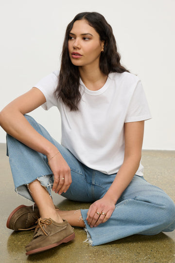 The Leigh Tee from Velvet by Graham &amp; Spencer is crafted from a super soft cotton jersey and features a crew neck, banded trim and a relaxed boxy fit.&nbsp; This tee literally gets softer and increasingly comfortable the more you wash and wear it.