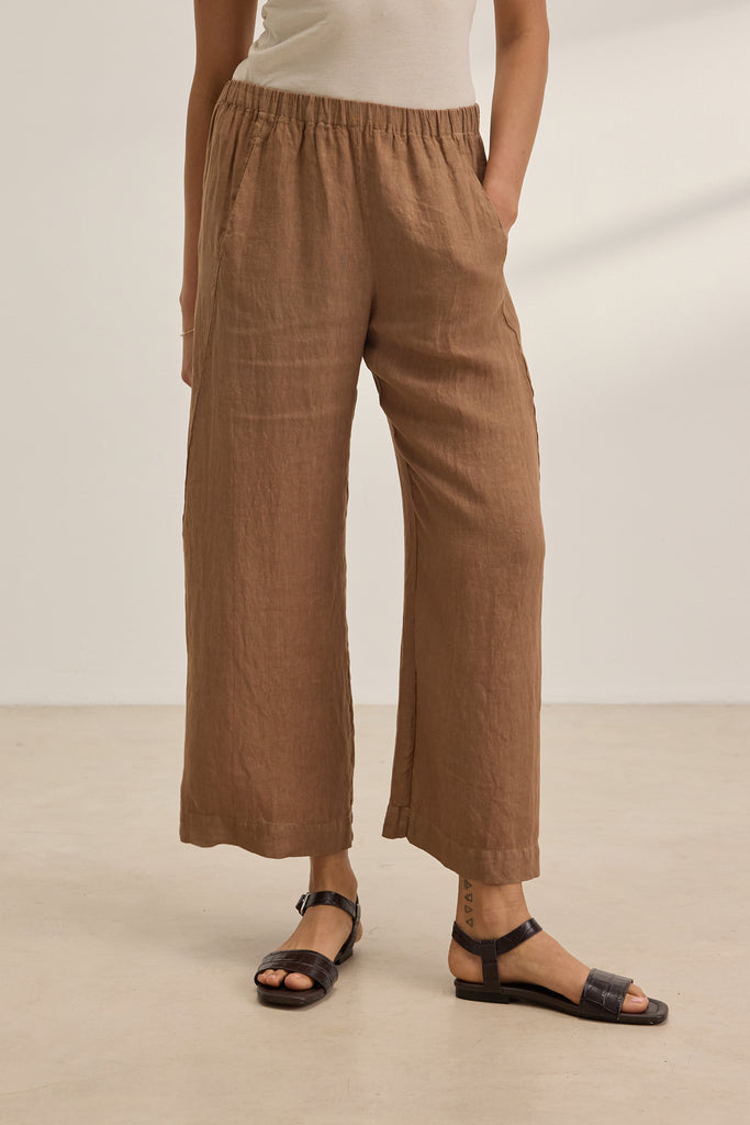 Velvet by Graham &amp; Spencer's fabulous Lola trousers are back this season in this gorgeous brown. Crafted from woven linen these easy to wear pull on trousers feature a relaxed leg and a very slight ankle crop making them the perfect choice for a summer day.