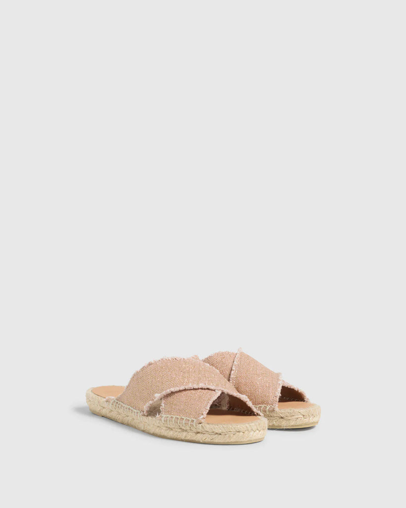 The Palmera sliders are so comfortable you'll never want to take them off. Featuring fabric frayed canvas crossover straps and a super easy to wear woven jute base these are the perfect Summer footwear choice. Wear these literally with everything from shorts to dresses!  
