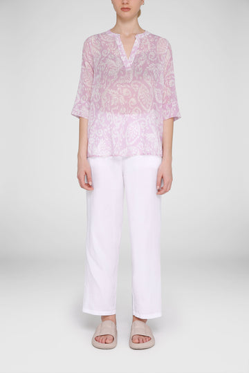 Beautifully feminine, this cotton and silk blend top is seriously pretty.  With a flattering v neck and 3/4 length sleeves this sheer blouse looks perfect paired with white trousers or denim.  If you're looking for something a bit different yet still easy to wear this is it!
