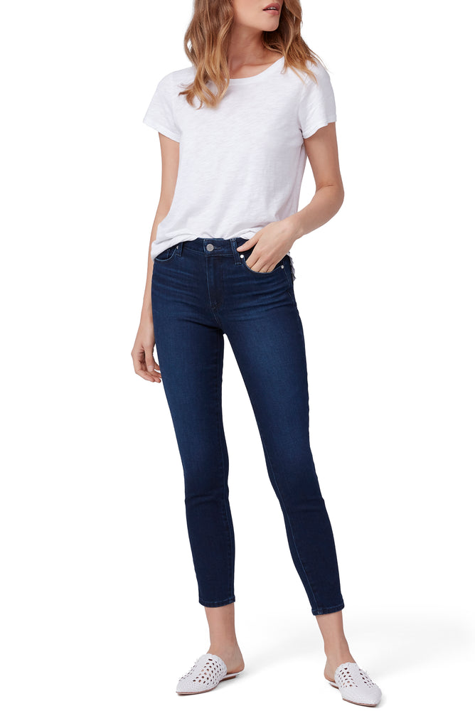 A great all rounder from our favourite jean brand Paige.  Crafted from their signature Transcend super soft denim featuring plenty of stretch and recovery and shown here in a great rich dark denim this is a jean that will hug your curves from dawn to dusk.  With a cropped ankle length, fitted from the hip to the leg opening and sleek pewter hardware this will be your new favourite!