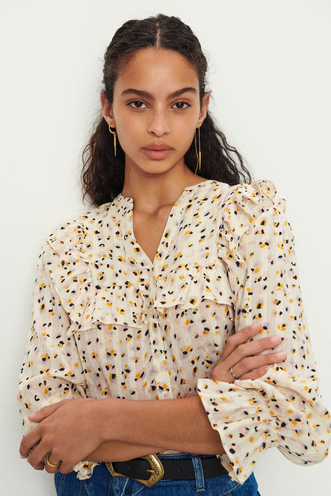 Say hello to Blake!  Crafted from ba&sh's signature super soft cotton and viscose blend this pretty button up blouse features an elasticated ruffle cuff, slightly relaxed shape and a ruffle at the chest.  Perfect paired with your favourite denim this is a top you'll reach for again and again!