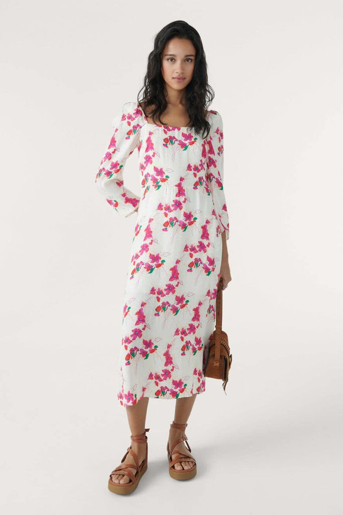 The Elonor midi dress from Ba&sh is designed to accentuate any figure! Feature a square neckline and mid length voluminous sleeves. The ultra feminine style and fluid material means this dress is comfortable to wear for any summer occasion. Pair with espadrilles or ankle boots for an edgier look.