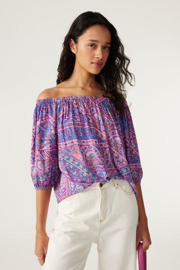The Fenji Blouse from ba&sh is everything you want in a Summer top!  Crafted from their signature super soft fabric in a pretty pink and blue print and featuring elasticated cuffs, balloon sleeves and a shoulder baring neckline this loose fitting top is perfect paired with your favourite white denim.