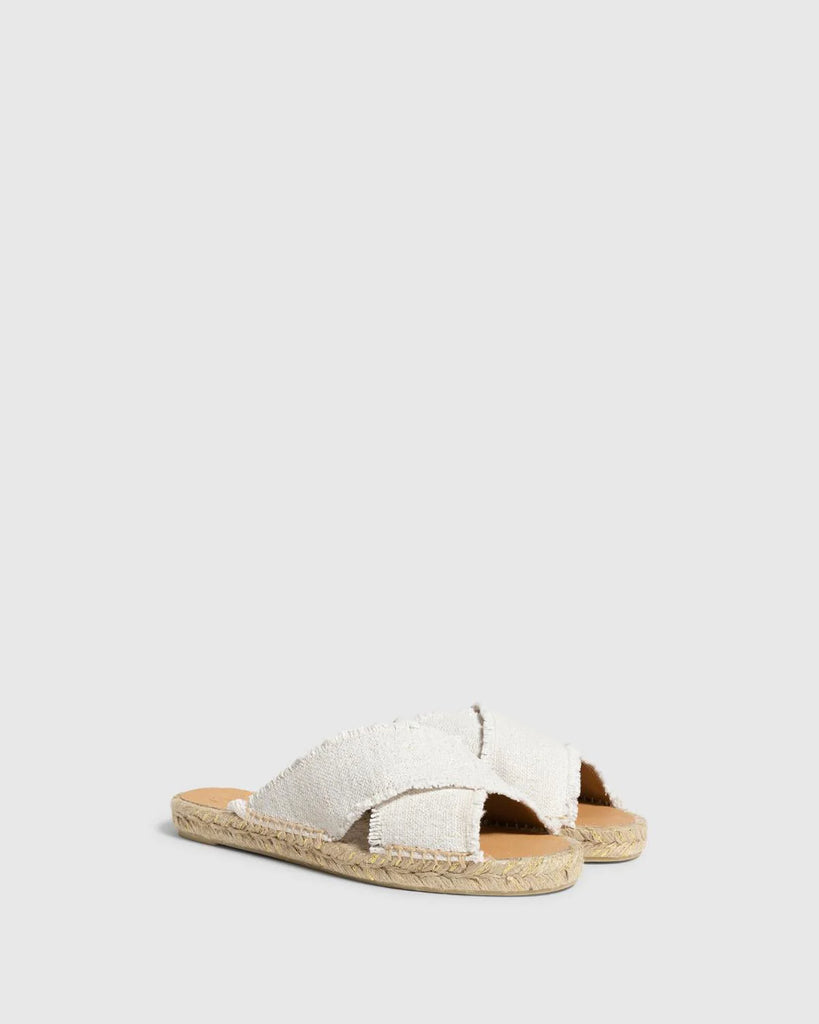 The Palmera sliders are so comfortable you'll never want to take them off. Featuring fabric frayed canvas crossover straps and a super easy to wear woven jute base these are the perfect Summer footwear choice. Wear these literally with everything from shorts to dresses!  