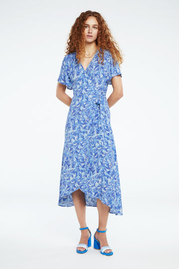 The Archana Butterfly Dress from Fabienne Chapot is an easy long flowing choice for warmer days. With short flirty flouncy sleeves, this is a wrap dress you'll throw on without a second thought. The flattering v neck and slightly shorter length at the front will make you reach for this again and again.