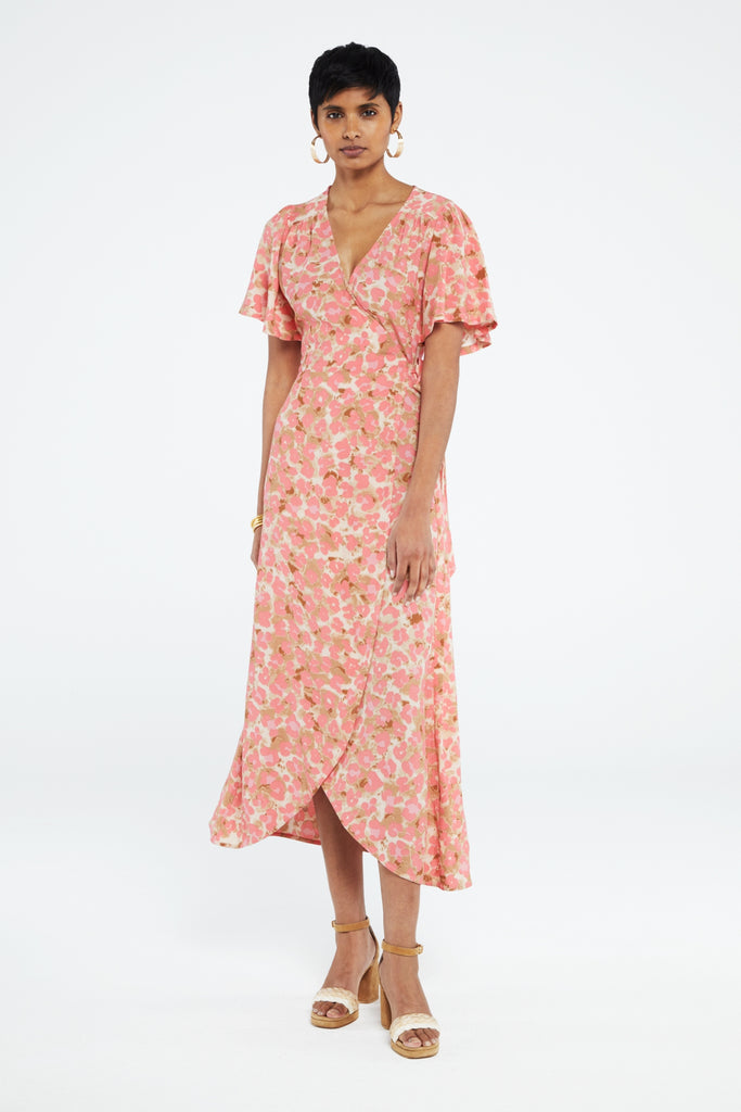 The Archana Butterfly Dress from Fabienne Chapot is an easy long flowing choice for warmer days. With short flirty flouncy sleeves, this is a wrap dress you'll throw on without a second thought. The flattering v neck and slightly shorter length at the front will make you reach for this again and again.