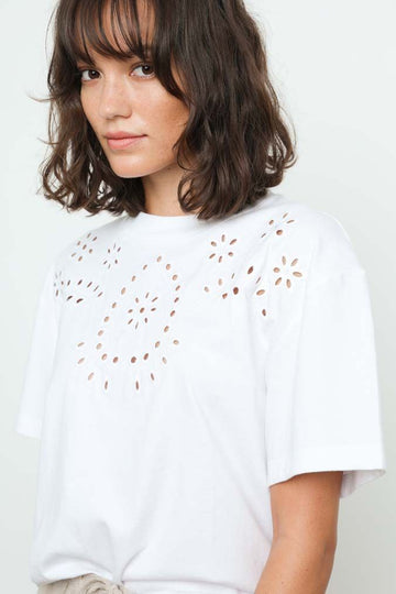 Bright white crew neck tee crafted from super soft cotton jersey featuring short wide sleeves, eyelet embroidery, a boxy fit and cropped length.  The eyelet embroidery gives this top a romantic and feminine feel and looks fab paired with your favourite denim or maxi skirt.