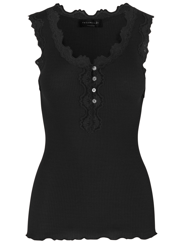 Gorgeous silk & cotton cami by Rosemunde, featuring a slim fit with buttons halfway down the front, lace at the neckline and no side seams.  This is the perfect layering piece for all your winter jumpers and cardigans or to update your loungewear outfit.  