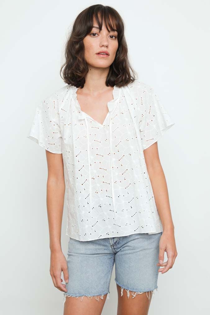 This pretty super feminine top from Rails is perfect for when the weather heats up.  Crafted from ultra lightweight textured cotton and featuring a flattering v neck, floral eyelet embroidery throughout, a relaxed fit and dainty flutter sleeves this is perfect paired with your favourite denim or shorts.
