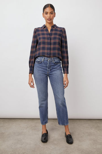 Super soft vintage flannel long sleeved shirt from Rails.  Featuring a navy plaid design, relaxed fit, shirring at the cuffs and puff sleeves this is a slightly more feminine take on the always popular Hunter from Rails.