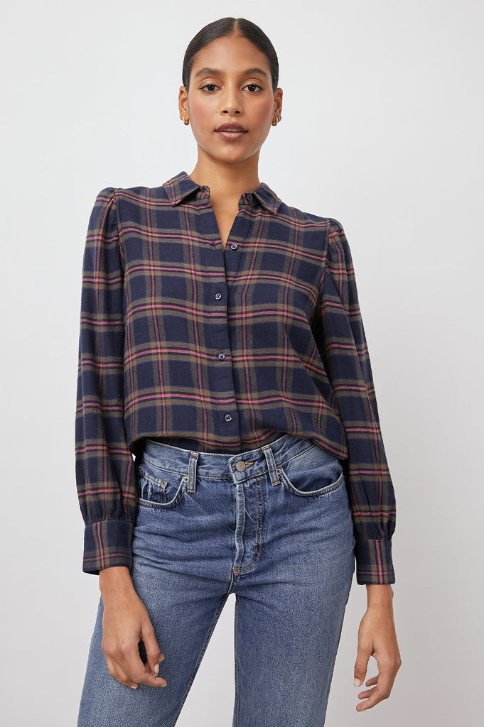 Super soft vintage flannel long sleeved shirt from Rails.  Featuring a navy plaid design, relaxed fit, shirring at the cuffs and puff sleeves this is a slightly more feminine take on the always popular Hunter from Rails.