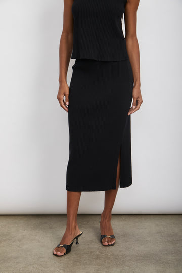 The Angie Skirt from Rails is crafted in a super soft ribbed knit jersey and features a high elasticated waistband, a slim-straight fit, stretch fabric and a flattering side slit. This easy to wear pullover skirt is the perfect elevated take on comfortable but effortless dressing.