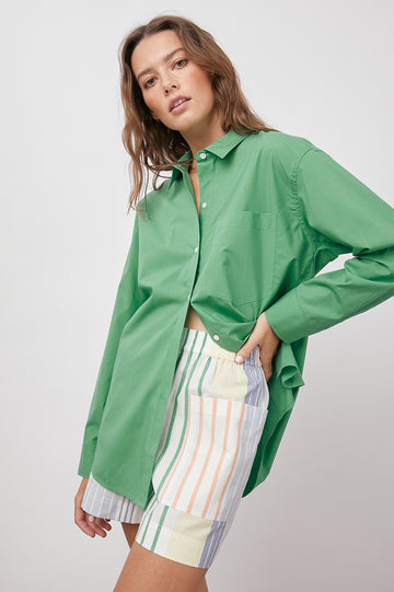 This crisp, collared button down from Rails features a classic fit, patch pocket at the chest and is crafted from lightweight organic cotton poplin.  In a gorgeous bright green this can be dressed up for work or paired down with a white vest underneath and unbuttoned and untucked for the weekend!