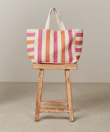 The Ellin Bag from Hartford is a handloom cotton tote with large vertical pink and orange stripes. Perfect as a shopper or beach bag - this is spacious enough for all your summer essentials.