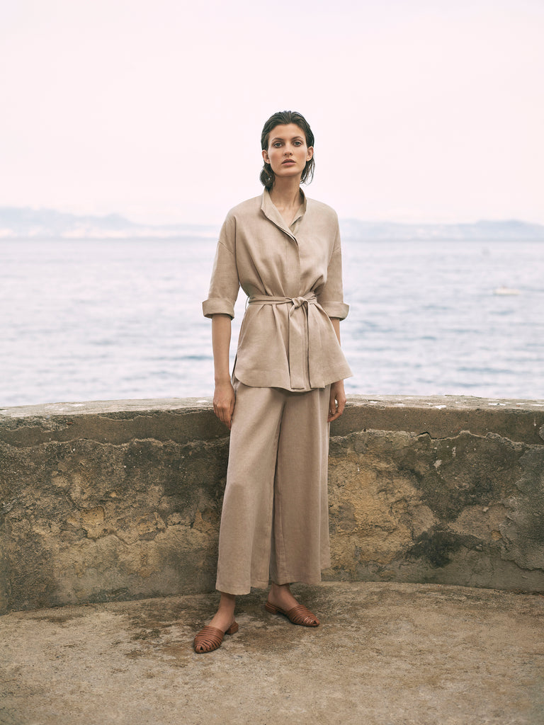 This effortless button-down shirt from Amina Rubinacci, features a tie-waist and mid-length sleeves. This is the perfect staple for your transitional wardrobe.  Looks fab paired with the matching Chantilly Trousers.