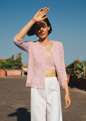 The Maura Jacket from Amina Rubinacci is in a stunning pink tone and features 3/4 length sleeves, fringing at the hem and a clasp fastening. Wear over a dress or pair with Amina Rubinacci's classic Cherie Trousers for a smart everyday look.