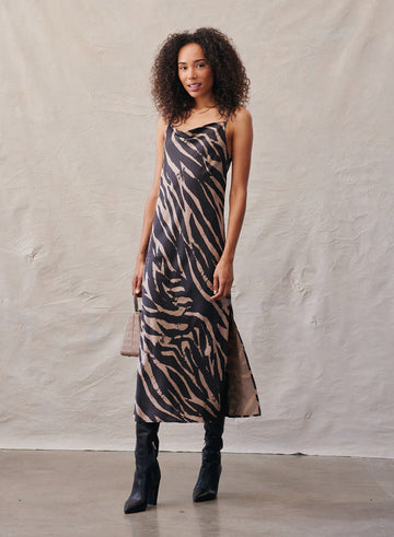 We're loving this slip dress from Bella Dahl.  Crafted from super soft fabric in a fun zebra print this is an incredibly versatile piece.  Easily goes from day to night by wearing a chunky cardigan and trainers for the day and then come evening slip off your cardi, slip on some heels and you're ready to dance the night away!  Love it!  Flirty and fun!