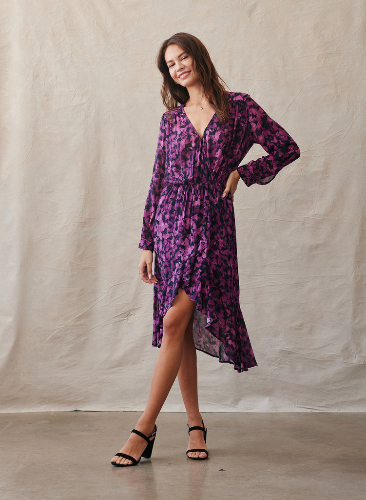 Say hello to Vera!  This gorgeous midi is flirty, feminine and fun!  In a pretty vibrant floral print and featuring a ruffled asymmetrical hem you can't help but want to dance and twirl when you put this on.  Pair casually with a trainer or with a pretty heel for an elevated evening look.  The sheer super soft fabric drapes beautifully!