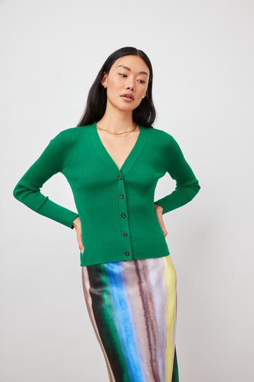 The Beau Cardigan from Rails is a new transitional styling staple. In eye-catching green, this fitted cardigan is in a ribbed knit and features a v-neckline and buttons down the centre. Wear as a buttoned up top or open as a cardigan to carry you through all seasons.