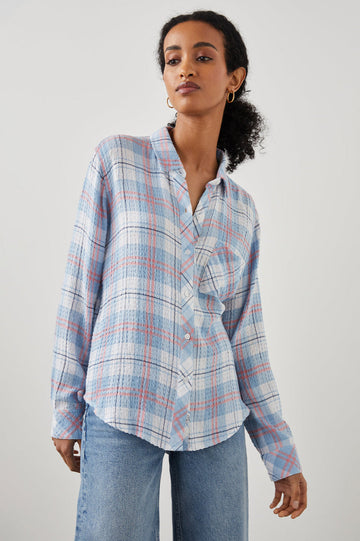 The Brady Top is a lightweight button-down with a unique textured effect and this season's comes in a pretty pale blue, white and pink colour-way. This shirt is bound to be your new favourite layering piece. Made from stretch seersucker fabric, this shirt comes in a relaxed fit and has a single patch pocket at chest.  Perfect with your favourite denim.