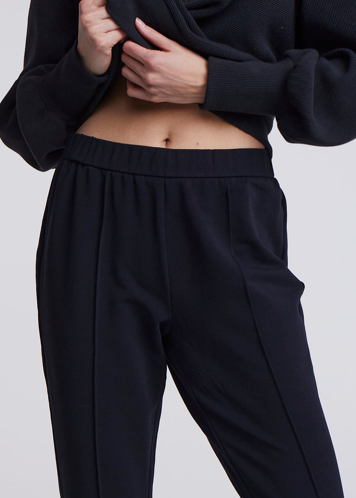 The Hanley Black Pant is a beautifully tailored sweat pant with dart seams at the front of the leg and a comfortable elastic waist.  Perfect when you want your leisurewear to be just a little bit smarter.  