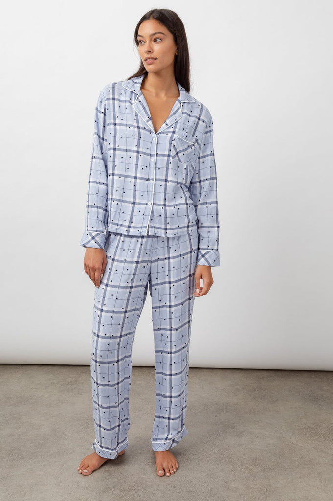 Rail's super soft Clara pj's are back in a pretty powder blue plaid print with flocked stars.  Crafted from cozy rayon the top features a button down shirt style, white piping detail, patch pocket at the chest, a pj style collar and relaxed fit and the bottoms couldn't be comfier and feature a drawstring at the waist and a relaxed fit as well.  Perfect for the best nights sleep and lounging over brunch in the morning. You'll will literally never want to take them off!