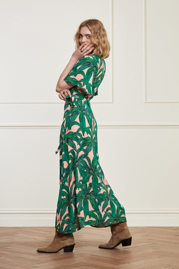 The Archana Dress from Fabienne Chapot in a gorgeous green print is an easy long flowing choice for warm days.  With short flouncy sleeves and a discreet button at the bust this is a wrap dress you'll throw on and go.  The flattering v neck and slightly shorter length and the super soft fabric will  make you reach for this again and again.
