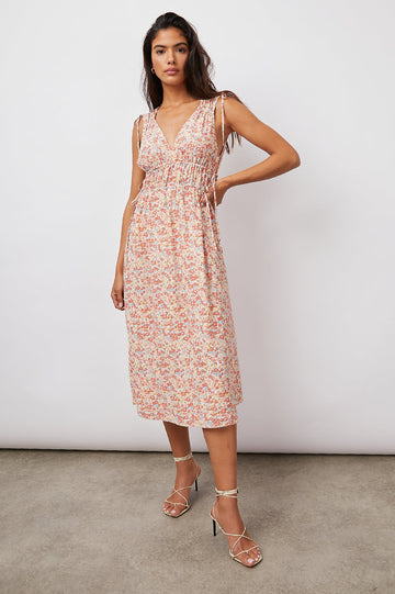 This pretty summer midi dress from Rails features a gorgeous pastel floral print, a v-neckline, a concealed adjustable waist band and adjustable ruching at the sleeve. This is the perfect dress to style with white trainers for a more casual look or dress up with a pair of espadrilles.