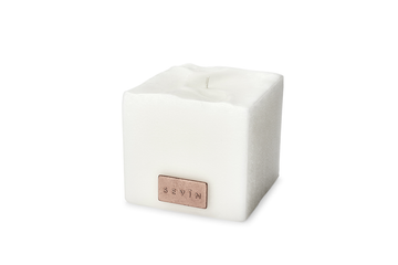 Sevin London's Porcelain White Scented Candle combines sweetness of amber with delicate notes of white jasmine petals accompanied by a hint of nutmeg.