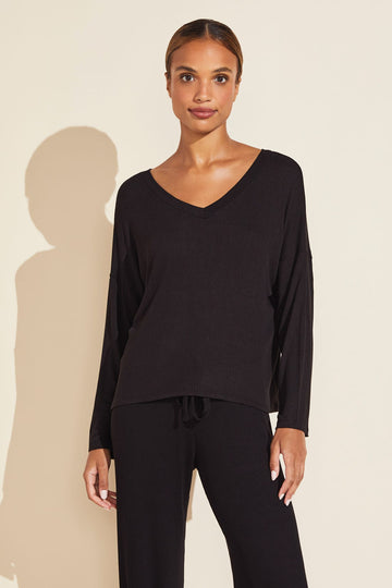 The Elon Pullover is made from a light and airy ribbed fabric, it has just enough stretch to give effortless drapability. This relaxed loungewear piece feels soft against the skin and its cooling breathability is ideal for those who run warm. The pull-on V-neck top has a flattering neckline and forgiving fit that makes it perfectly suited for wearing at home or out and about.