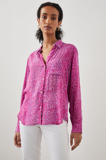 Calling all animal print lovers - the Josephine Top from Rails crafted from feather soft lightweight rayon in a pretty magenta cheetah print is for you.  With a classic relaxed fit, buttons down the front and patch pockets at the chest this looks perfect paired with white denim and the magenta definitely will add a pop of colour to your wardrobe!