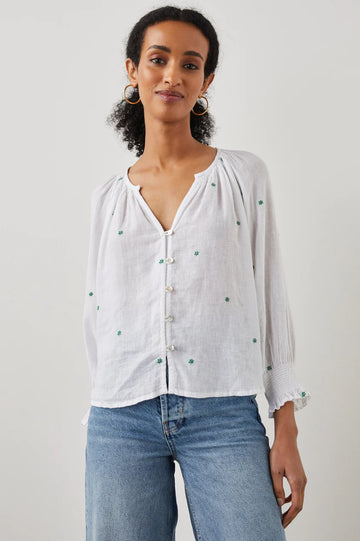 The Mariah Top from Rails is an incredibly easy to wear flattering wardrobe essential.  Crafted from Rails signature super soft fabric, it features pretty embroidered green daisies throughout, a button down front and elasticated wrists. This looks perfect paired with your favourite denim or shorts for a laid back easy look.