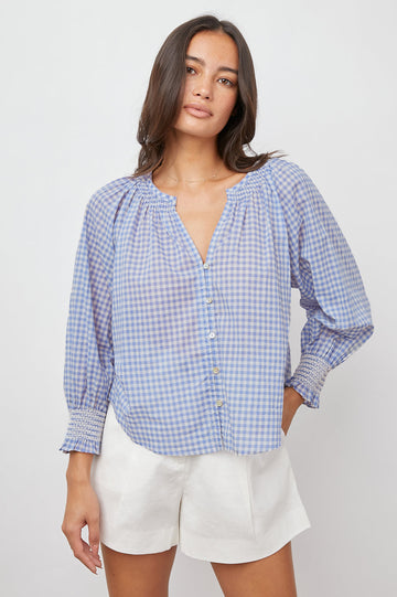 Mariah is an incredibly easy to wear flattering top from Rails.  Crafted from Rails signature super soft fabric in a pretty gingham print and featuring a button down front and elasticated wrists this looks perfect paired with your favourite denim or shorts for a laid back easy look.   