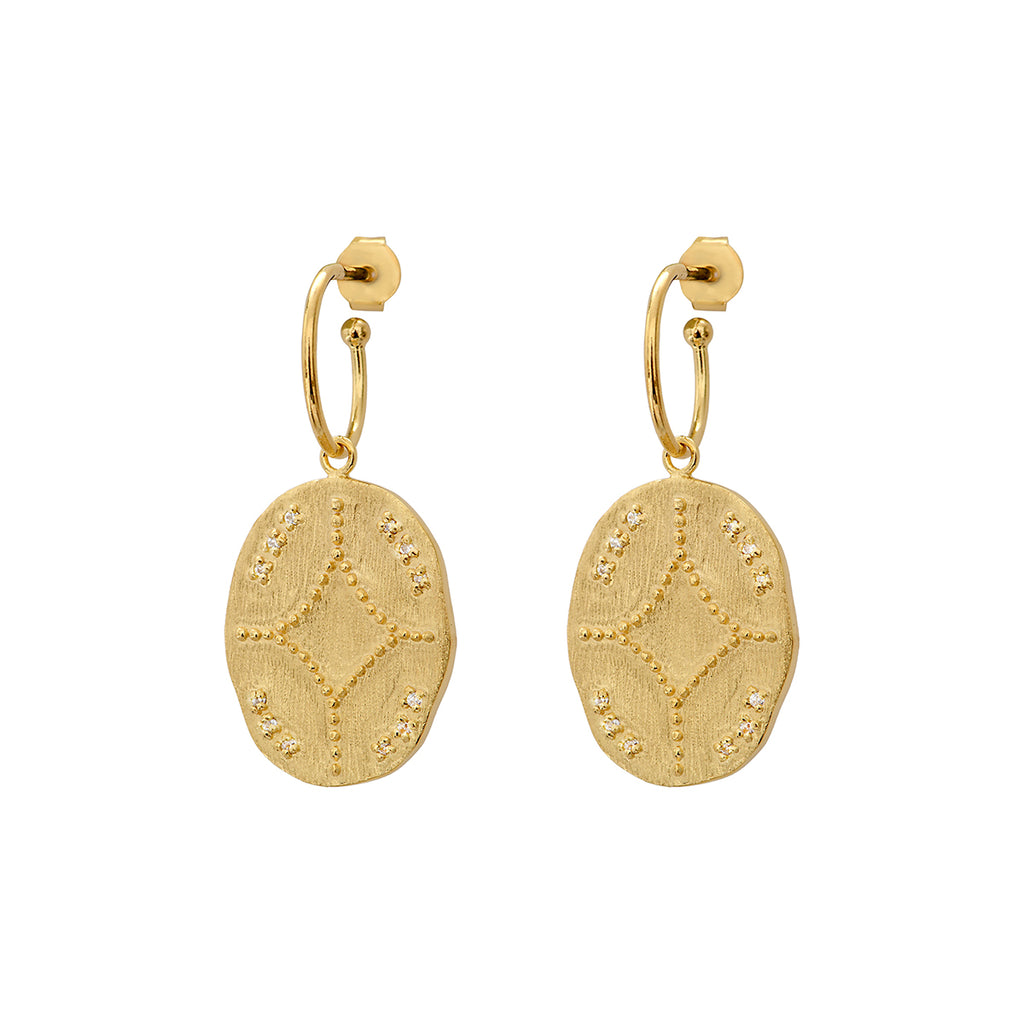 The Nomad Earrings are both elegant and chic.  The dainty discs which are decorated with raised petite white zircons are suspended from small hoops. They are as light as air and will definitely elevate any outfit.  Perfect for day or evening - we love these!