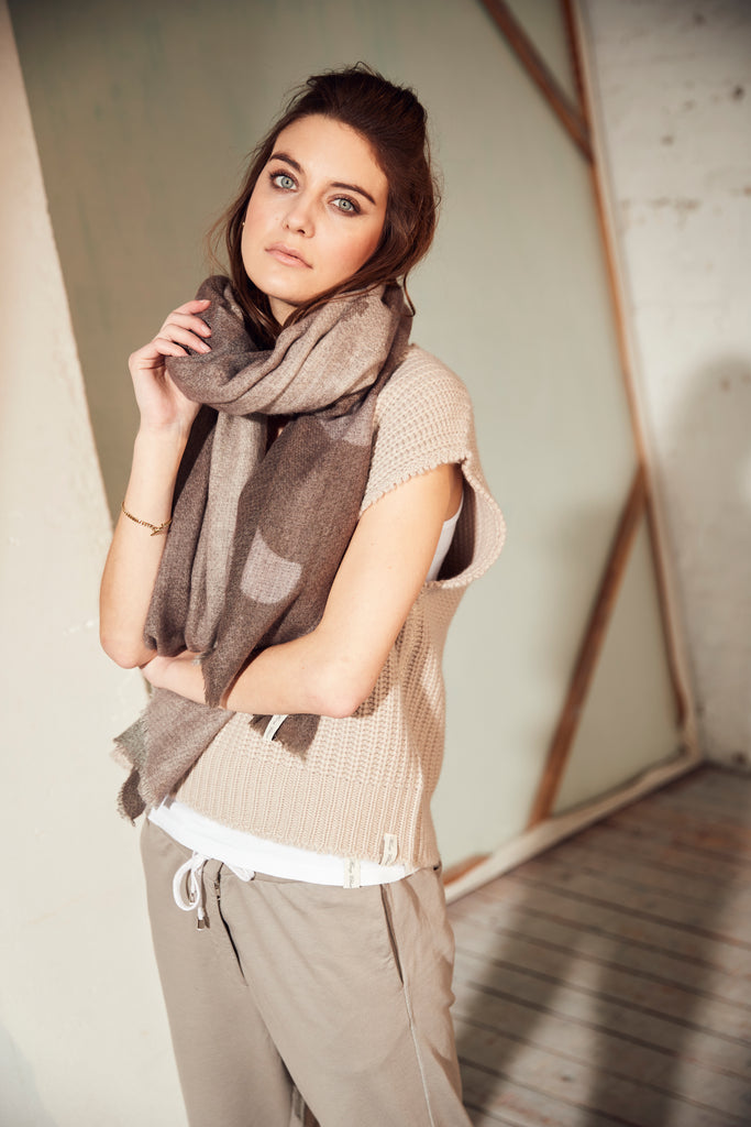 Can one ever have too many scarves!  We would argue not!  Especially when the scarf in question is a Henry Christ scarf.  Crafted from only the finest, longest cashmere threads these scarves are works of art.  This one in varying shades of neutral taupes will finish off your outfit to perfection.  Henry Christ scarves are also the perfect travelling companion!