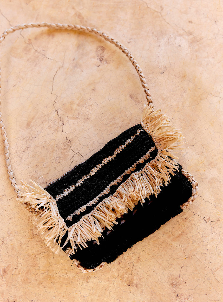 We are delighted to be stocking French brand Petite Mendigote.  The Renan Bag is a classic look made from 100% raffia.  It features fringed edging on the flap and a strap which can be worn on one shoulder or across the body.  It is a perfect addition to all your summer outfits!   