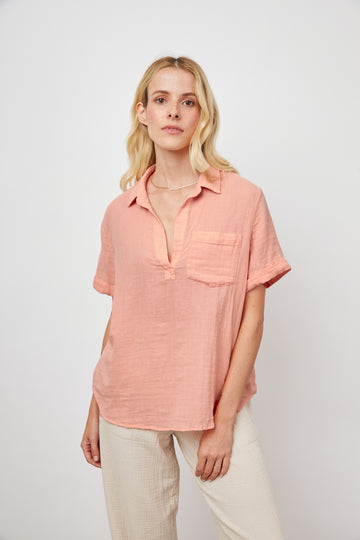 This effortless lightweight, cotton gauze, flamingo v-neck pullover from Rails features a relaxed fit, a half placket neckline, a patch pocket at the chest and rolled sleeves. Look refined and polished in this super soft, breezy style top.